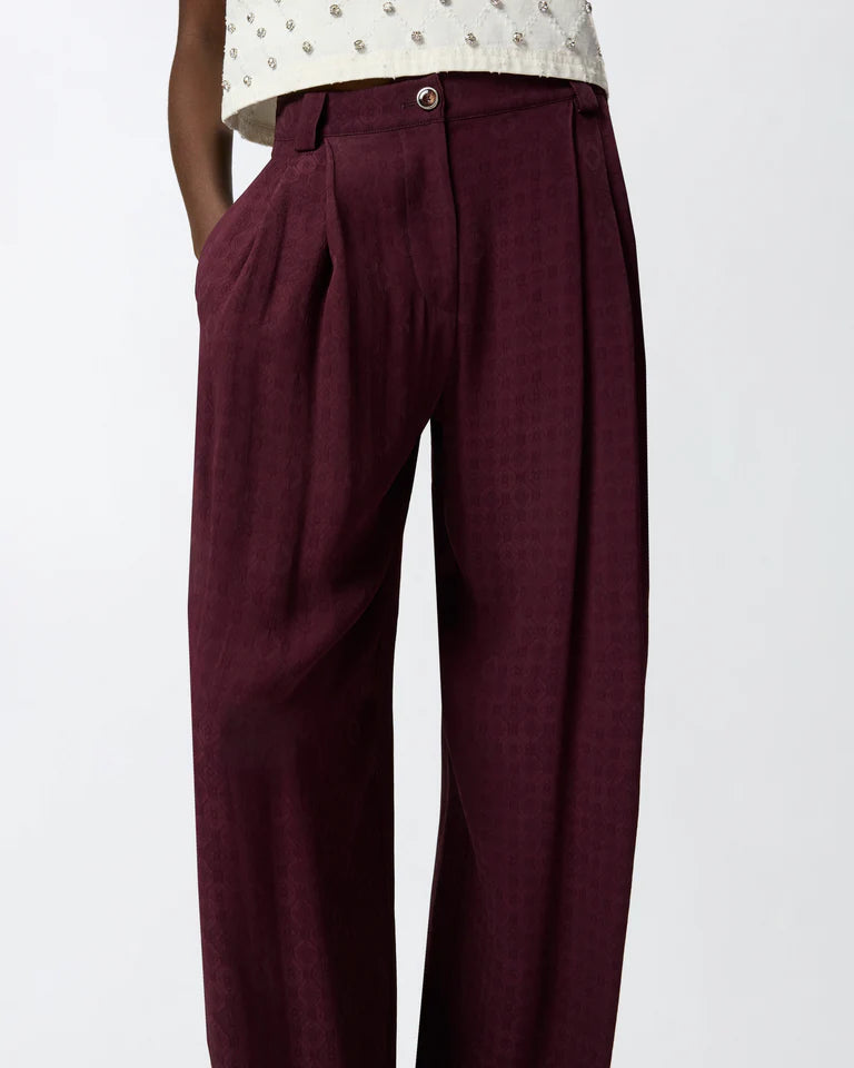 Pantaloni in jacquard con motivo cravatteria