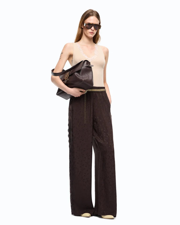 Pantaloni palazzo con motivo floreale e banda in pizzo