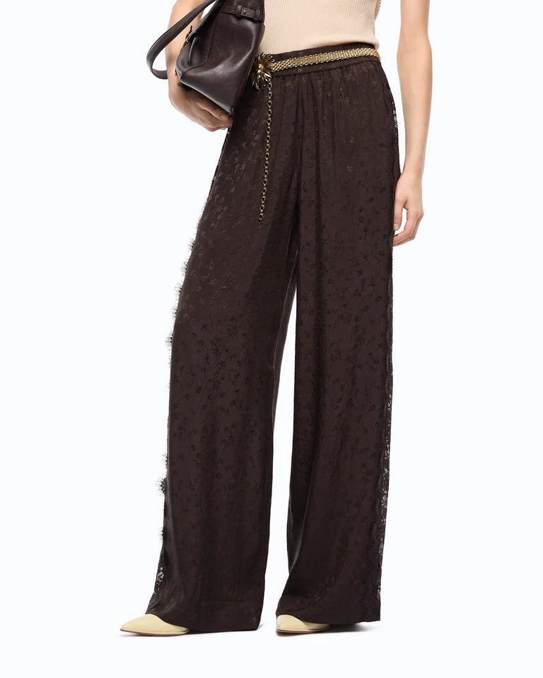 Pantaloni palazzo con motivo floreale e banda in pizzo