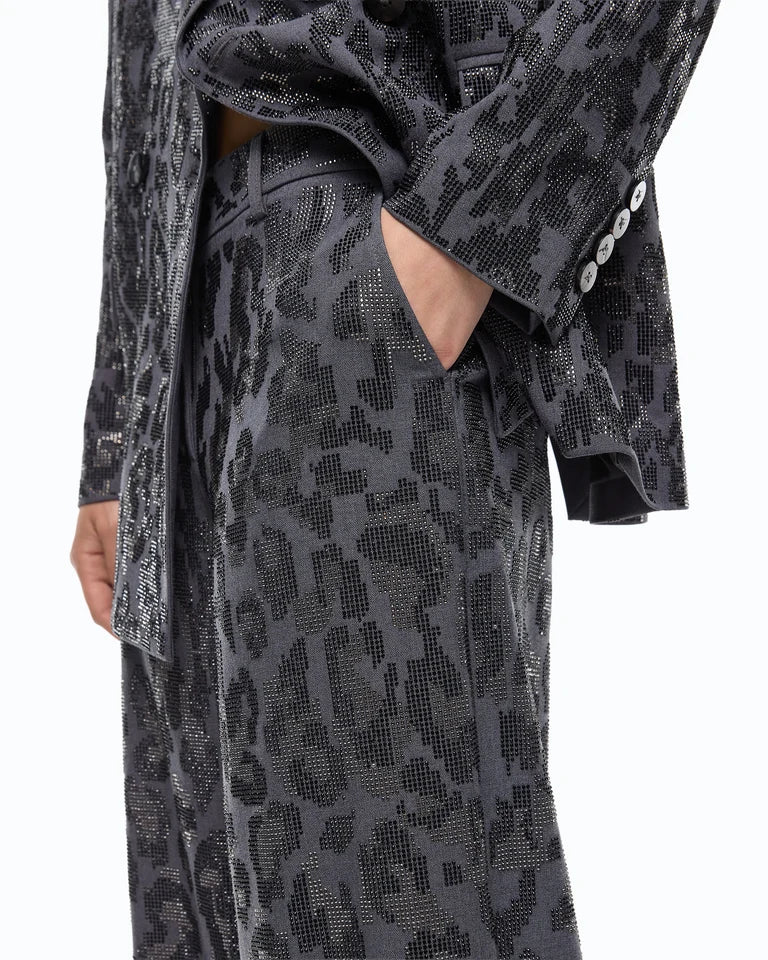Pantalone wide leg con fantasia maculata e microstrass