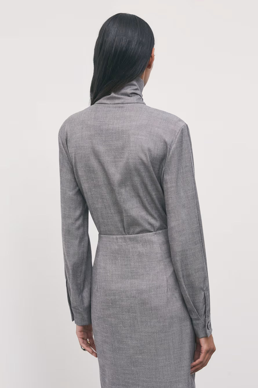 Blusa in flanella a collo alto con bottoni