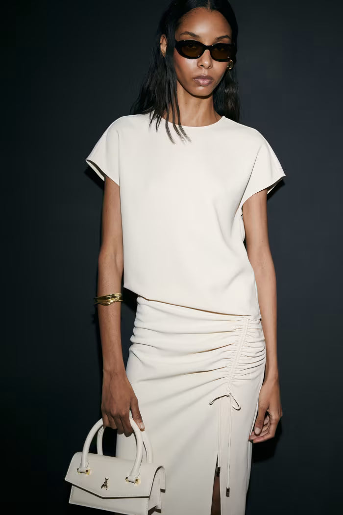 Blusa fluida smanicata