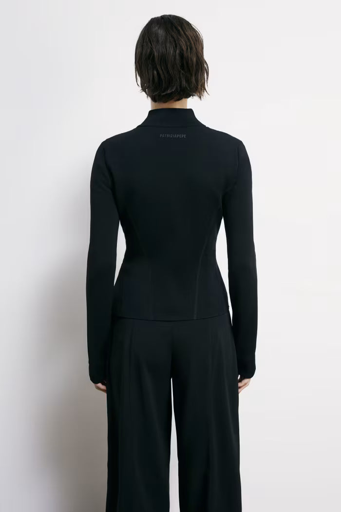 Piumino ultralight con inserti in maglia